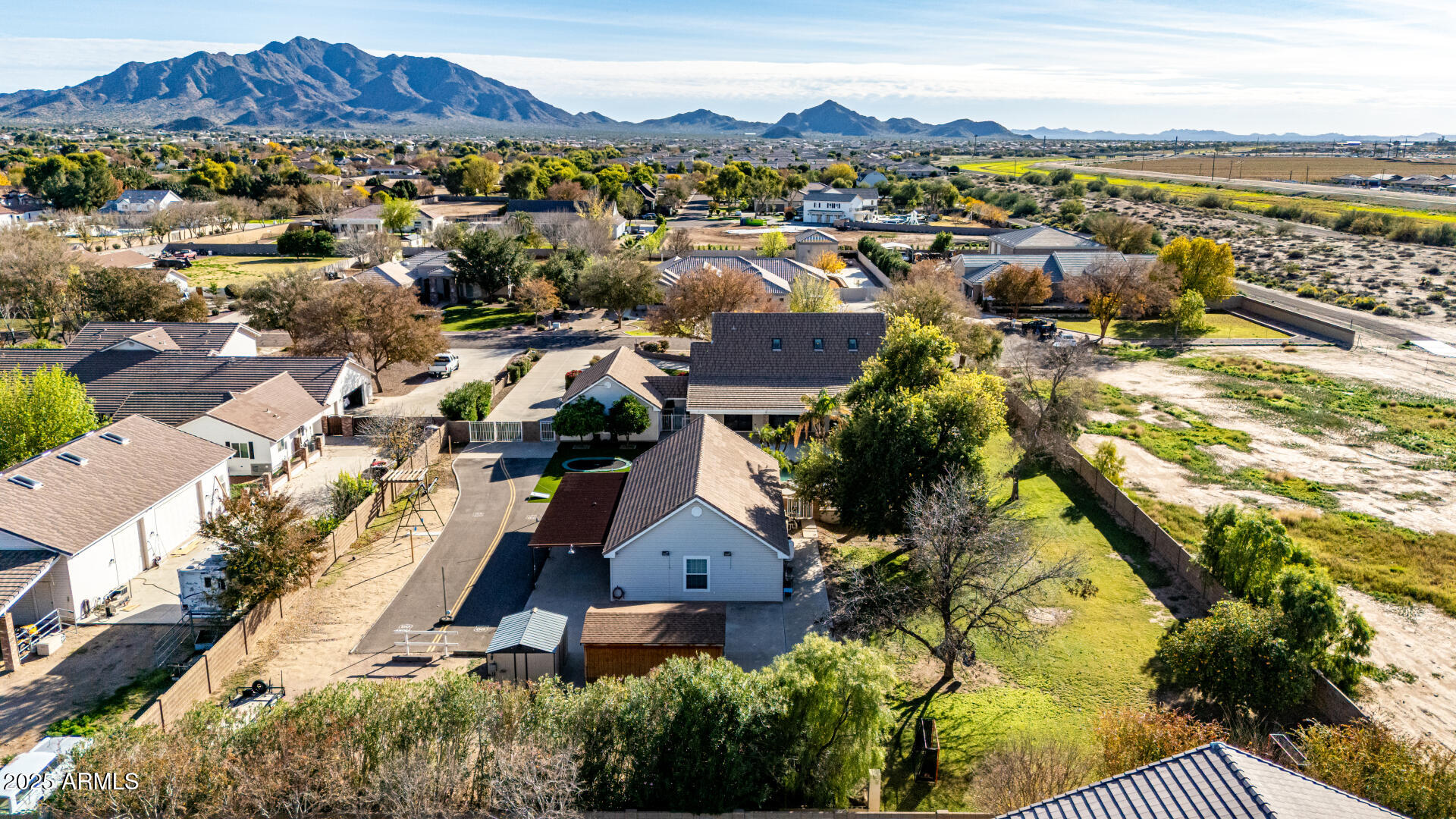 2552 East Ridgewood Lane Gilbert, AZ 85298 - Photo 79 of 80 an aerial view of residential houses with outdoor space and ocean view