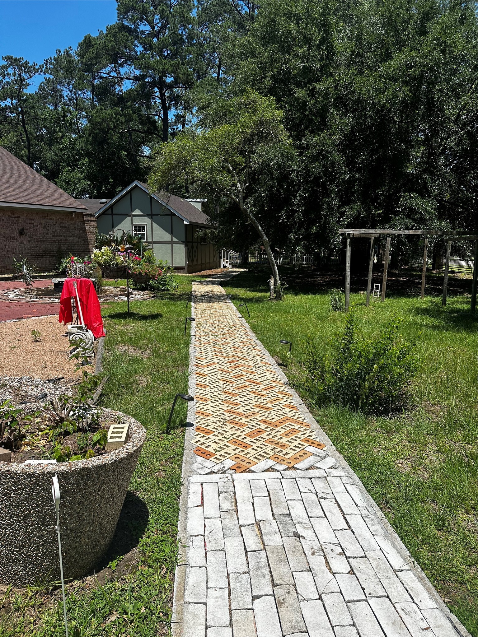 17821 Theiss Mail Rte Road, Unit C Spring, TX 77379 - Photo 17 of 21 Brick pathway to home
