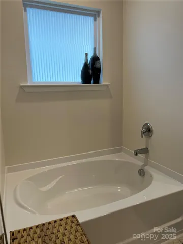 a bathroom with a bathtub