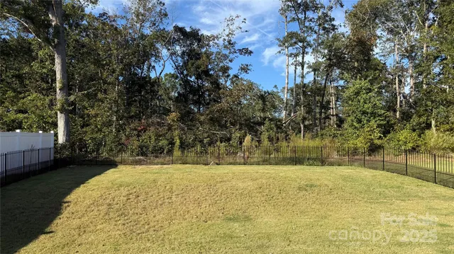 a view of swimming pool with an outdoor seating