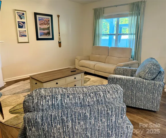 a living room with a couch and a window