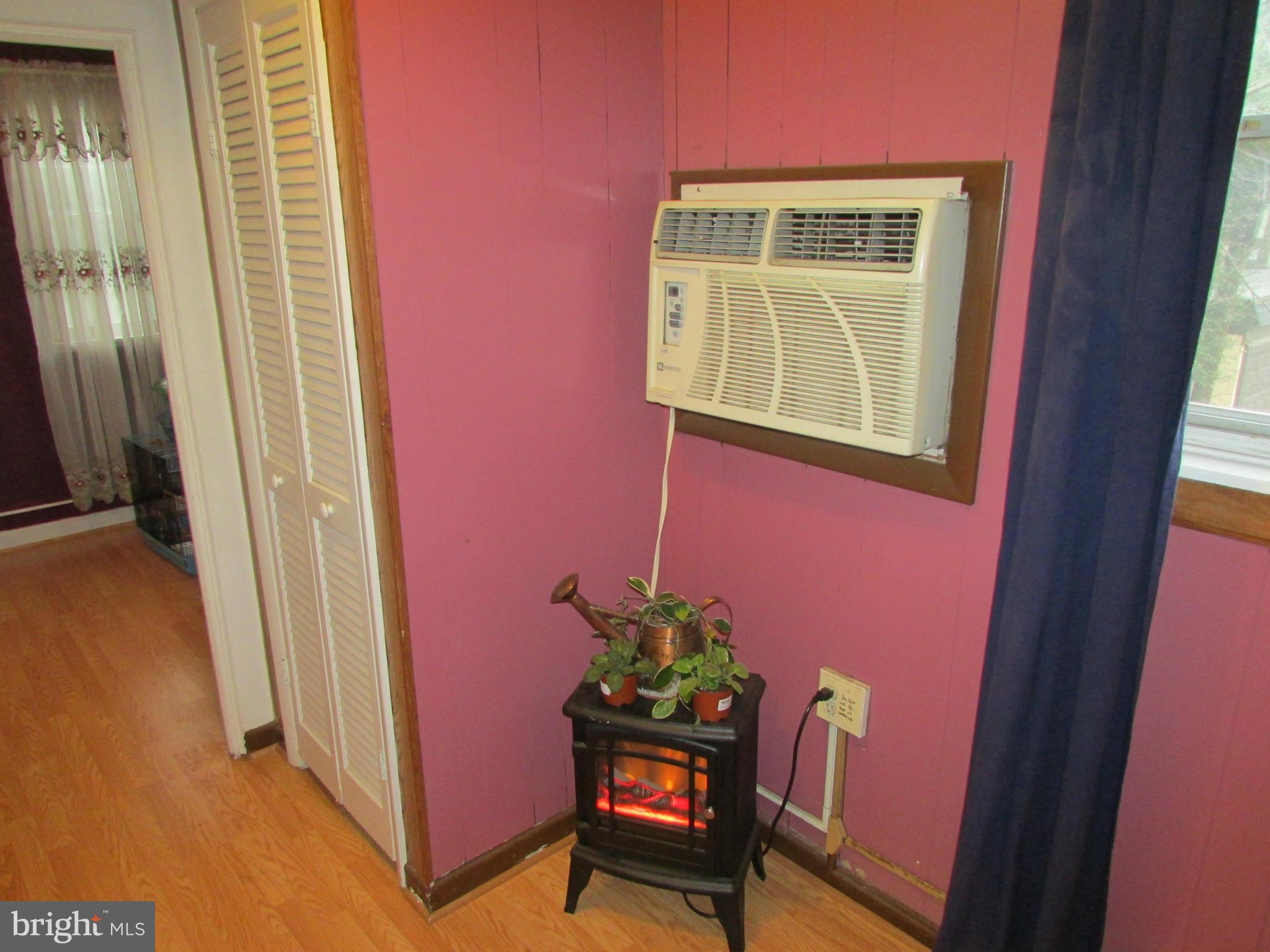 39 Ridge Road, Unit F Greenbelt, MD 20770 - Photo 13 of 14 a wooden bench sitting in front of a window