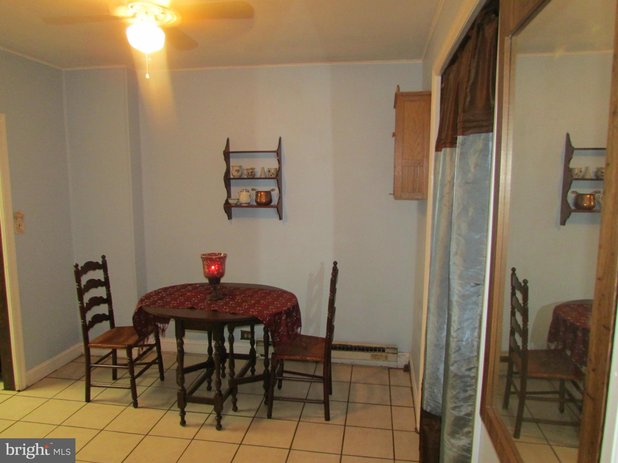 39 Ridge Road, Unit F Greenbelt, MD 20770 - Photo 8 of 14 a view of a dining room with furniture