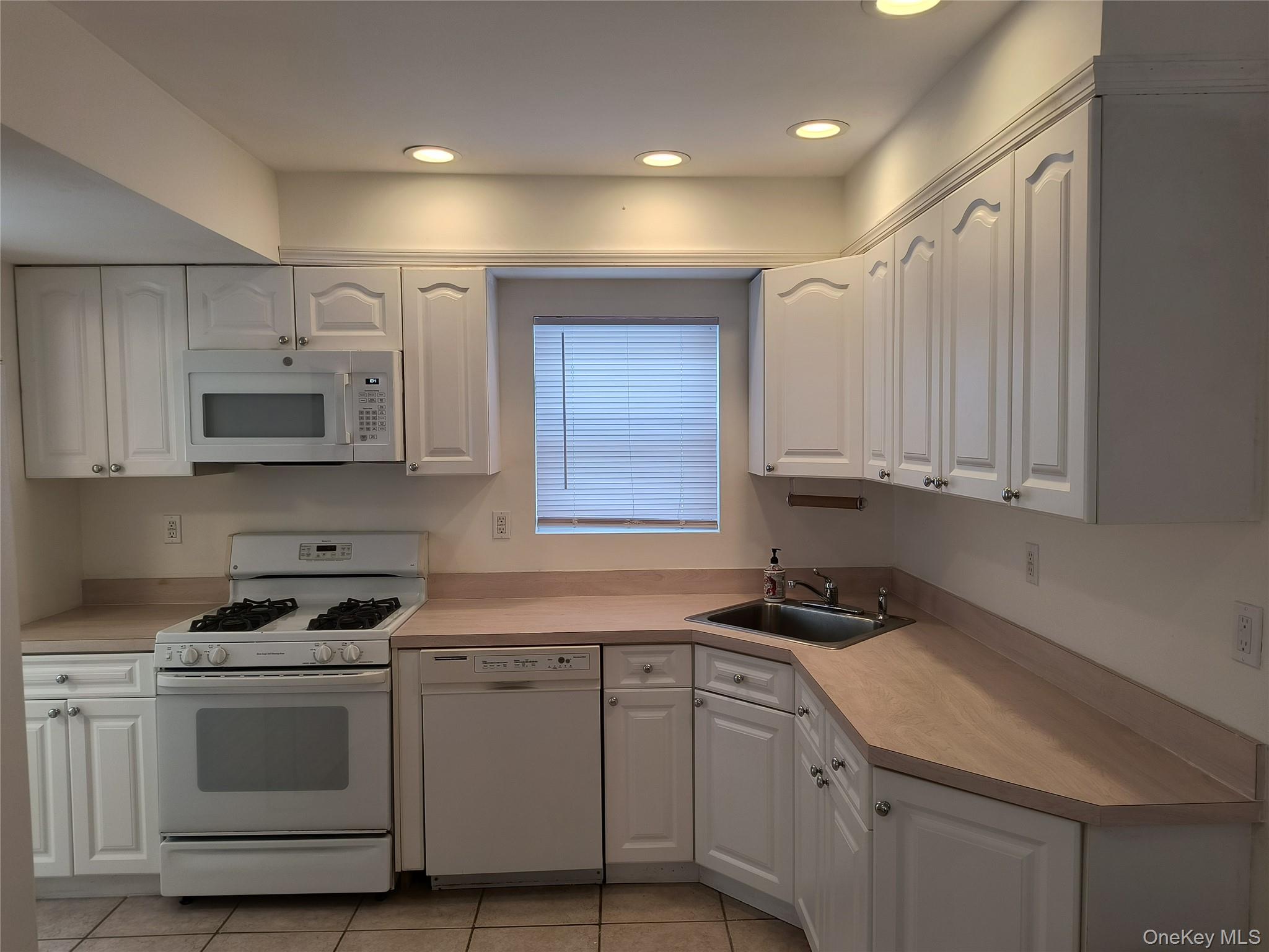 25 July Walk Long Beach, NY 11561 - Photo 3 of 15 kitchen with ample cabinets and counter space