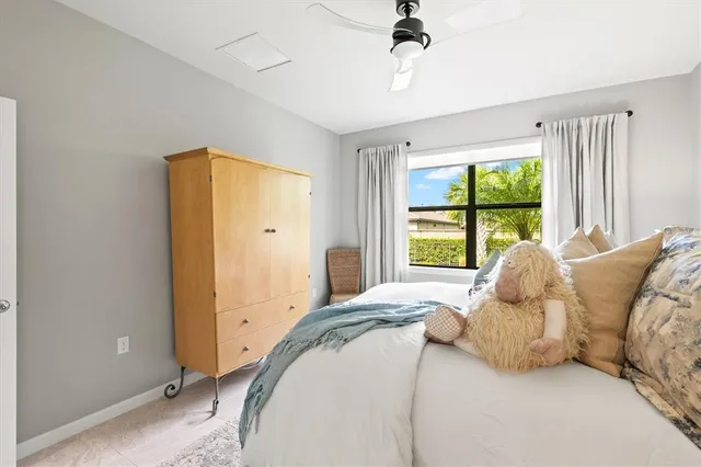 a bathroom with a granite countertop double vanity sink mirror and double