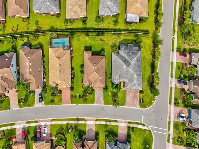 a view of a chairs and tables in the patio