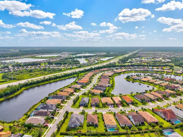 a view of a swimming pool with a sitting space
