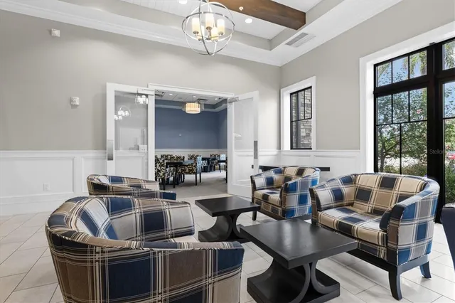 a view of a swimming pool in he middle of the house