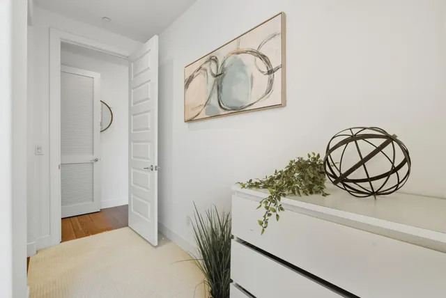 a view of a room with racks on the wall