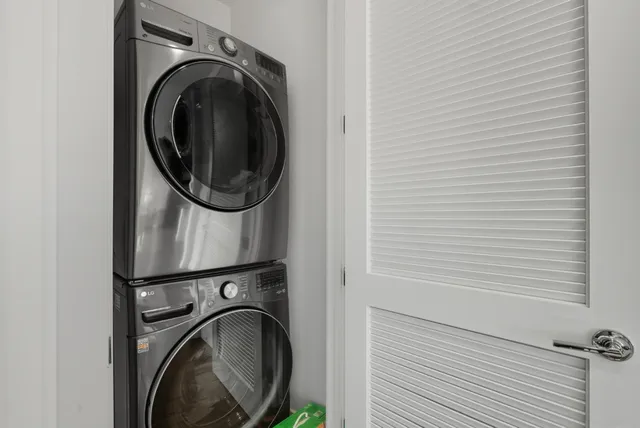 an aerial view of a residential apartment building with a city view