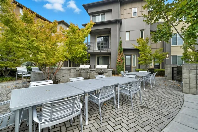an aerial view of a multi story parking building