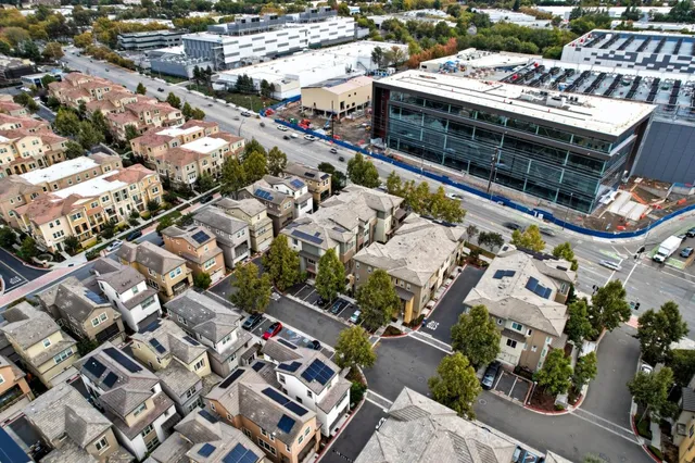 an aerial view of a city with lots of residential buildings