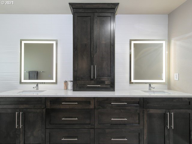 1663 South 14th Circle Ridgefield, WA 98642 - Photo 15 of 29 a bathroom with a sink and a mirror