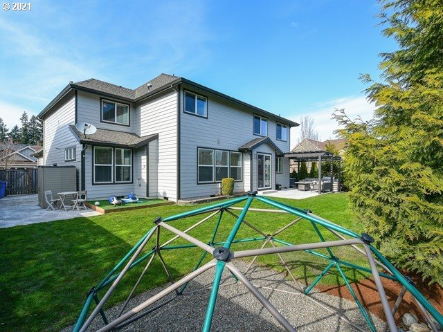 1663 South 14th Circle Ridgefield, WA 98642 - Photo 25 of 29 a view of a house with pool and sitting area