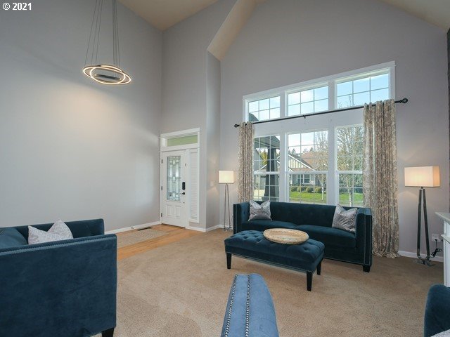 1663 South 14th Circle Ridgefield, WA 98642 - Photo 3 of 29 a living room with furniture and a large window