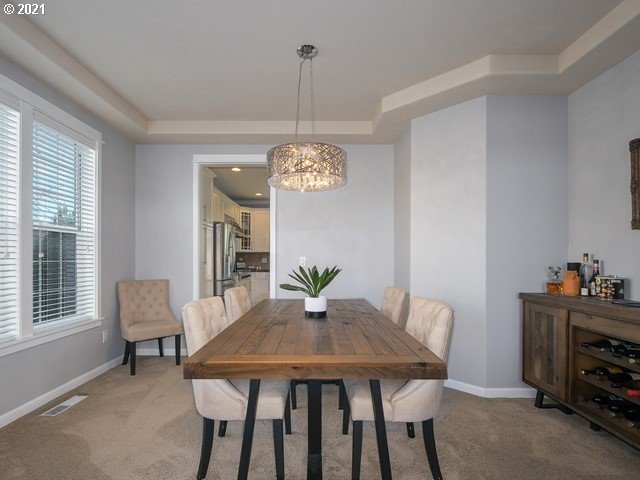 1663 South 14th Circle Ridgefield, WA 98642 - Photo 5 of 29 a view of a dining room with furniture window and outside view