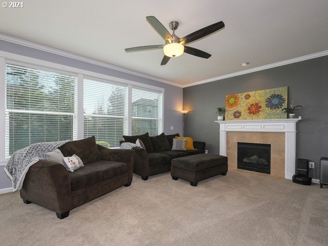 1663 South 14th Circle Ridgefield, WA 98642 - Photo 10 of 29 a living room with furniture and a fireplace