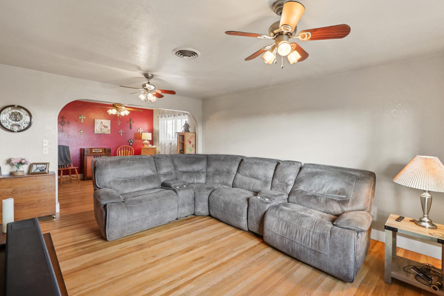 10691 Calvine Road Sacramento, CA 95830 - Photo 8 of 47 a living room with furniture and a chandelier