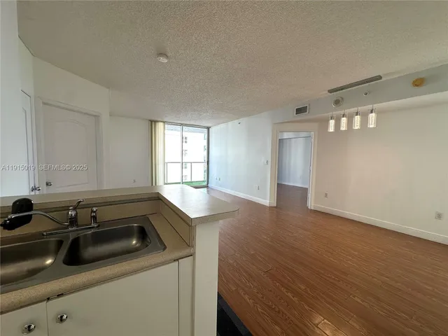 $2,450 | 5077 Northwest 7th Street, Unit 1408, Miami, FL 33126