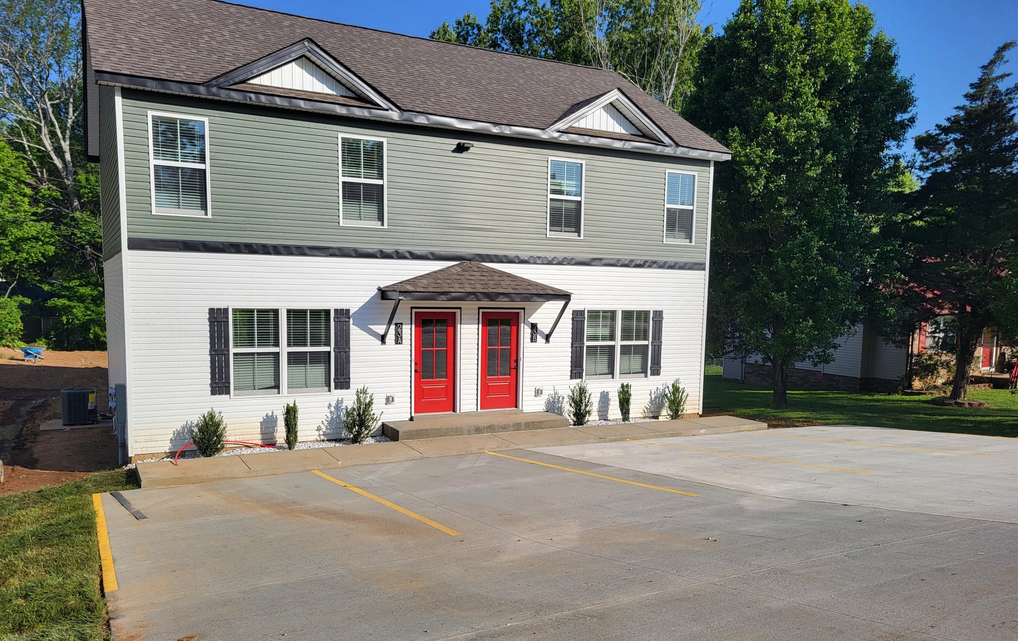23 Cable Road, Unit A Oak Grove, KY 42262 - Photo 1 of 5 a front view of a house with a yard