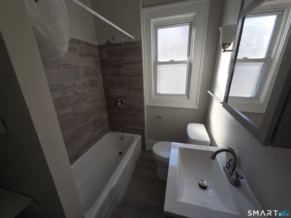a bathroom with a sink and a tub