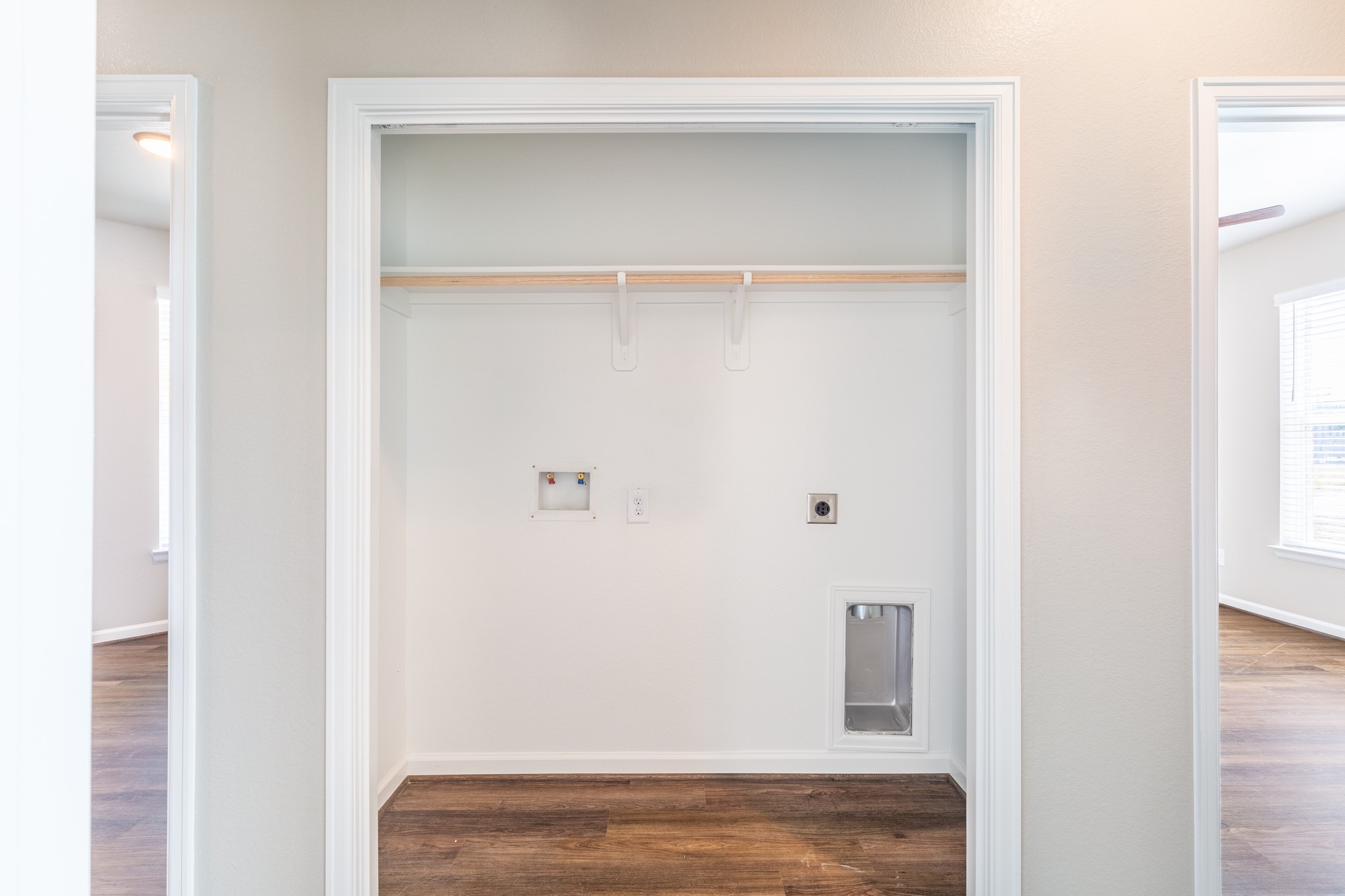 115 Park Place Circle, Unit B Waller, TX 77484 - Photo 14 of 24 a view of walk in closet with empty racks