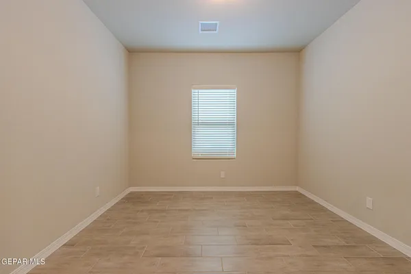 an empty room with a window