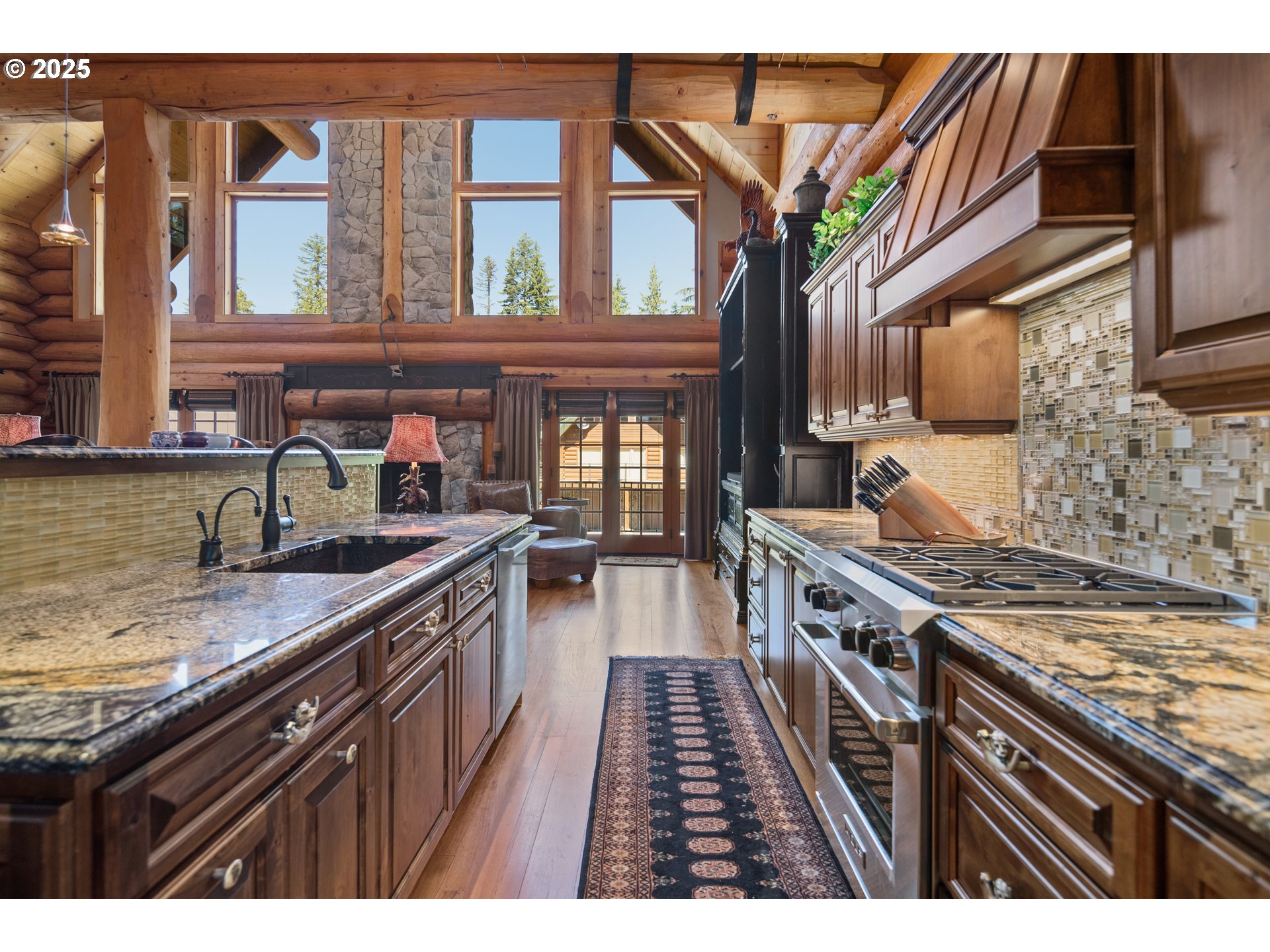 89790 East Morrison Lane Government Camp, OR 97028 - Photo 16 of 48 a kitchen with stainless steel appliances granite countertop a stove and a sink