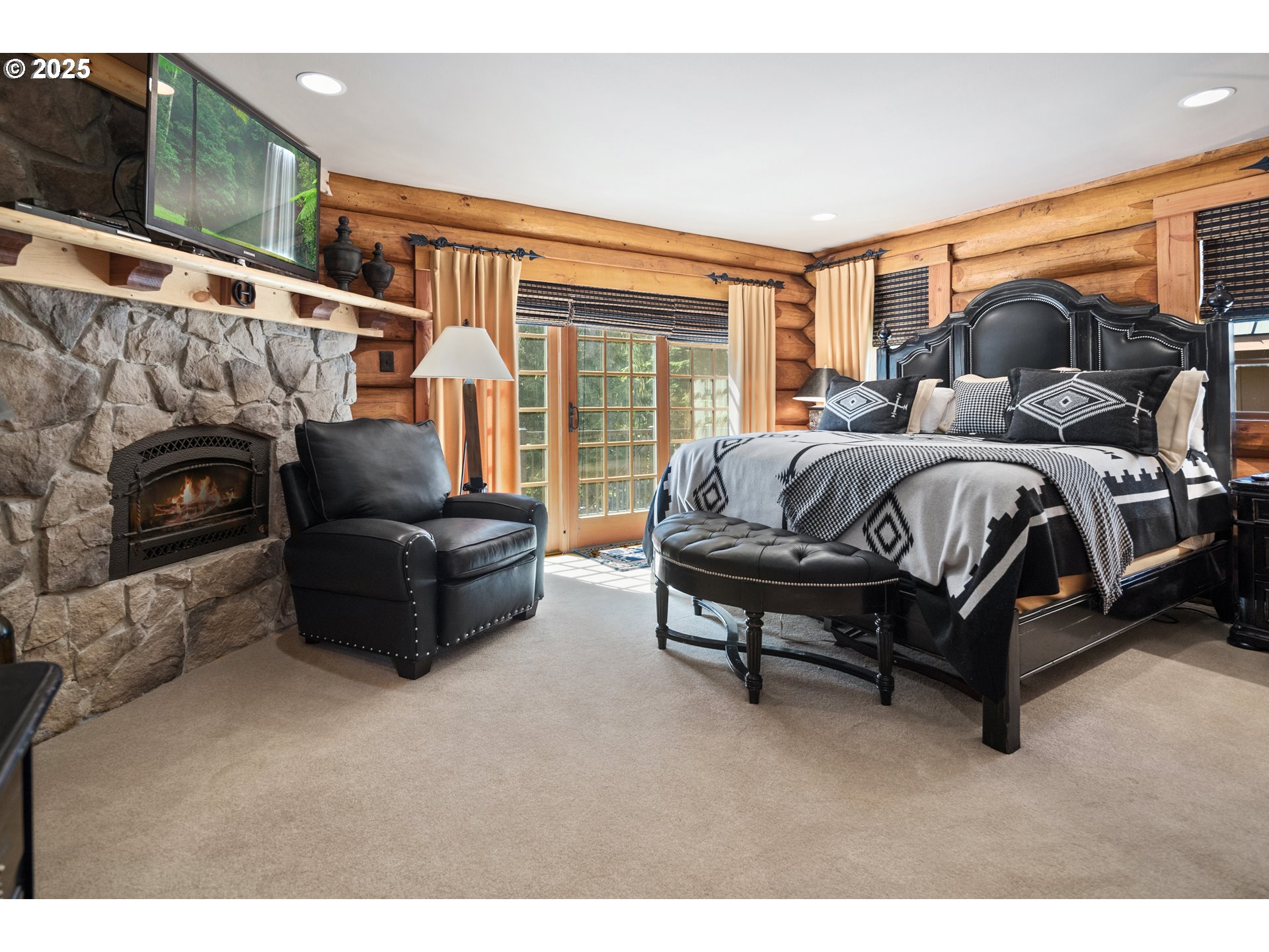 89790 East Morrison Lane Government Camp, OR 97028 - Photo 20 of 48 a spacious bedroom with a bed and a couch