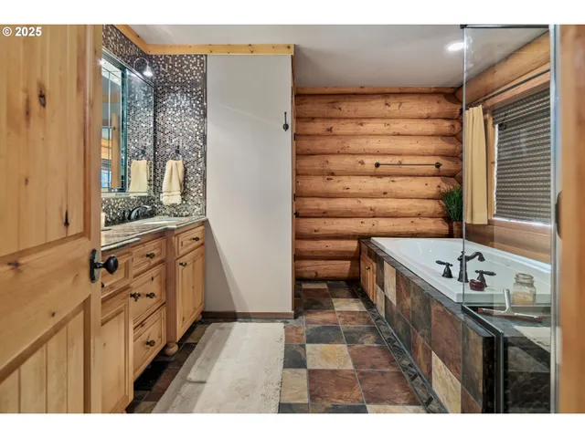 a kitchen with stainless steel appliances granite countertop a stove and a refrigerator