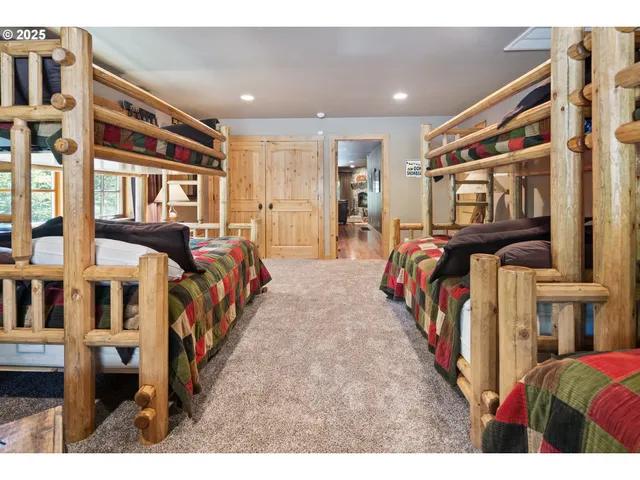 a view of a bedroom with furniture and staircase