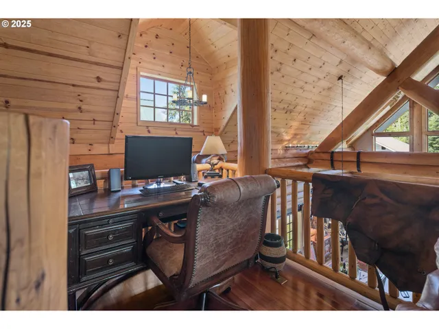 a view of a workspace with furniture