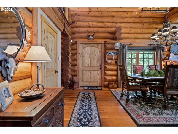 a view of a chairs and table in a patio
