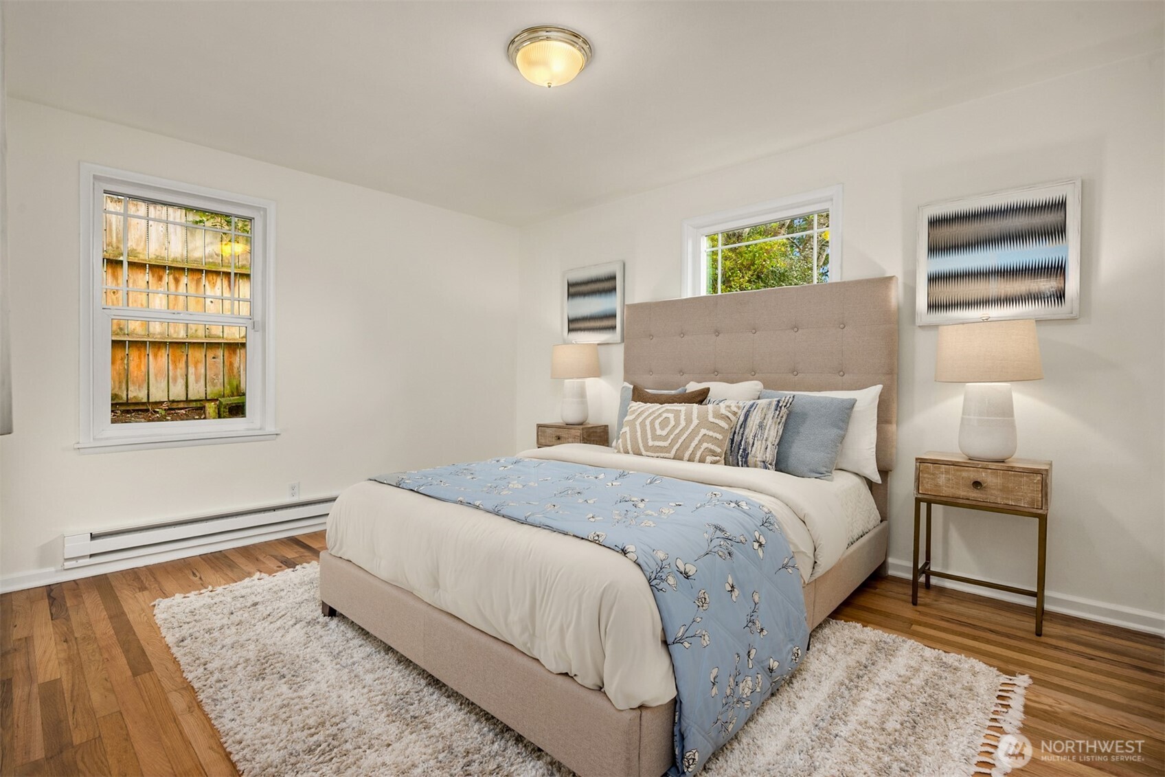5606 Northeast 59th Street Seattle, WA 98105 - Photo 15 of 28 a bedroom with bed and a window