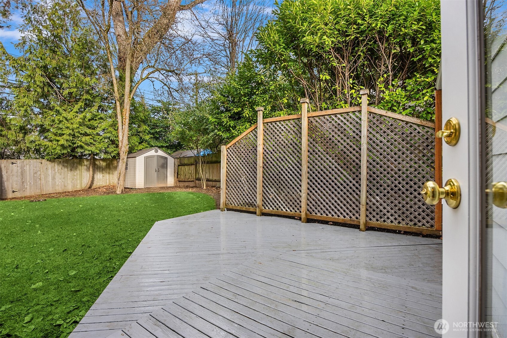 5606 Northeast 59th Street Seattle, WA 98105 - Photo 18 of 28 a view of a backyard with a deck