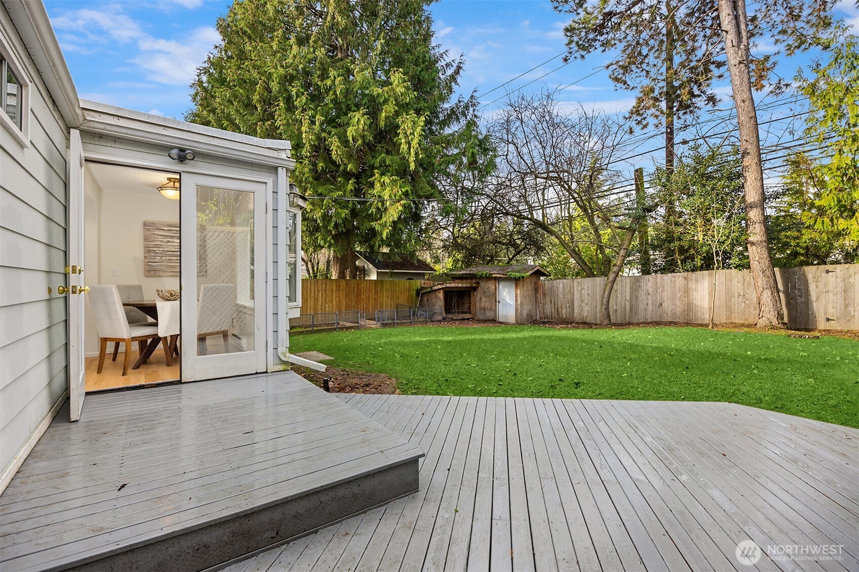 5606 Northeast 59th Street Seattle, WA 98105 - Photo 19 of 28 a view of a backyard with wooden floor