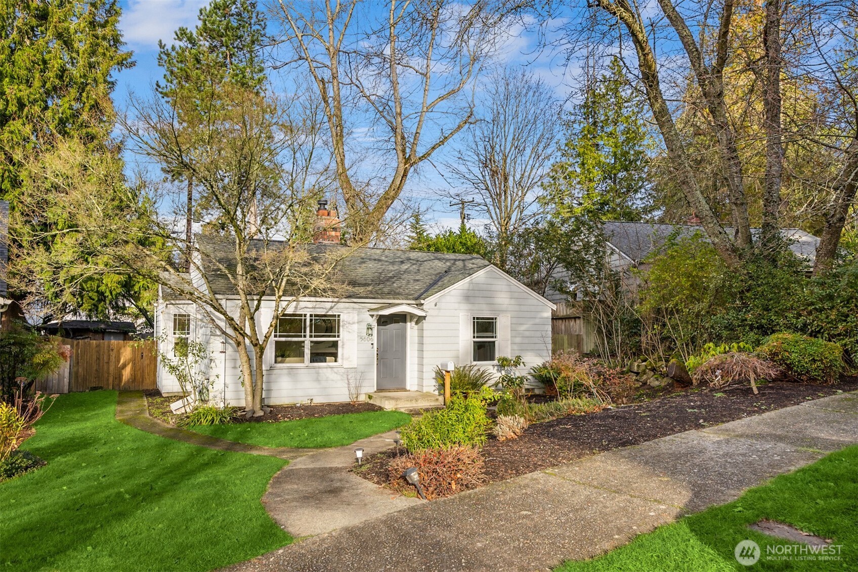 5606 Northeast 59th Street Seattle, WA 98105 - Photo 2 of 28 a front view of a house with garden