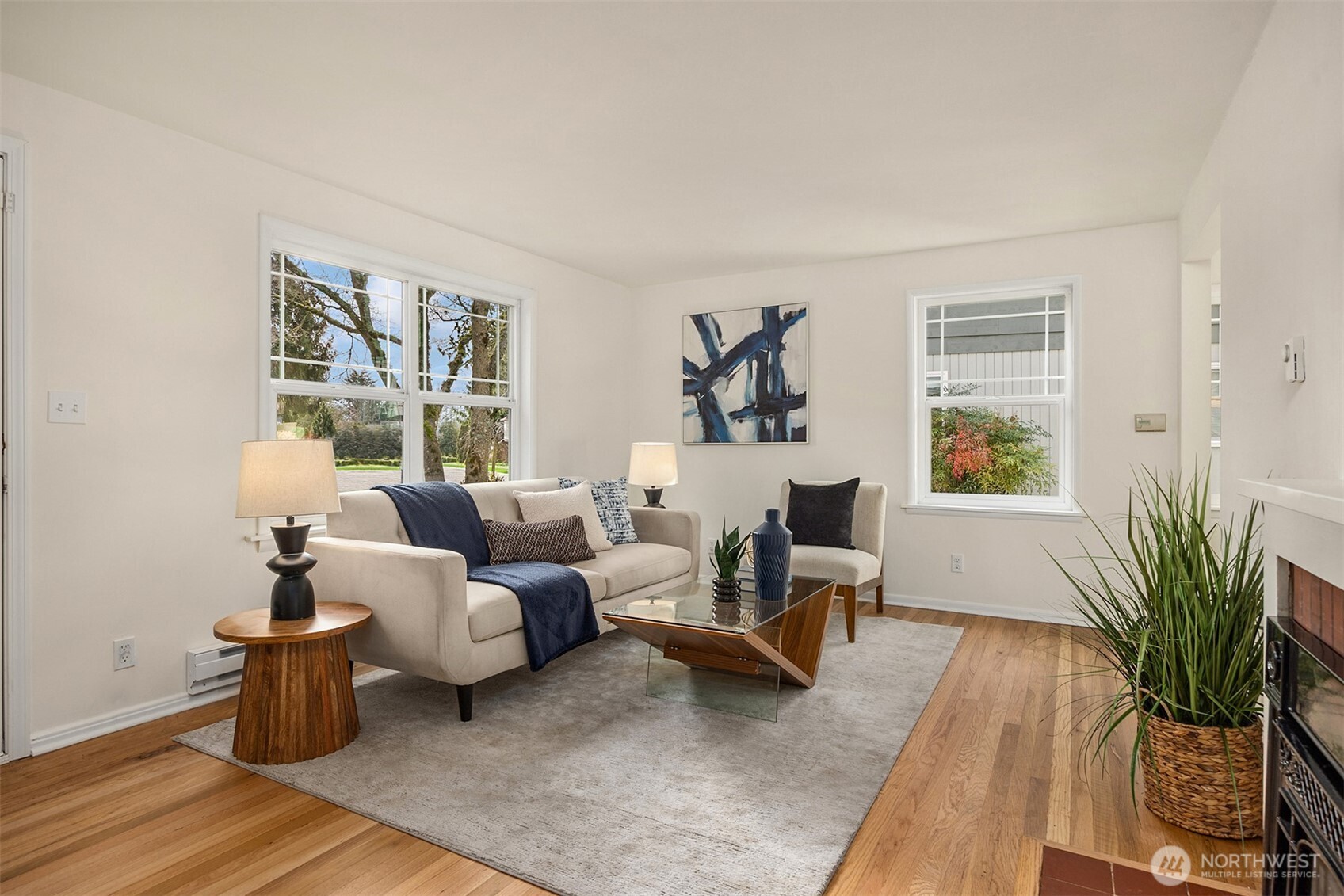 5606 Northeast 59th Street Seattle, WA 98105 - Photo 5 of 28 a living room with furniture and wooden floor