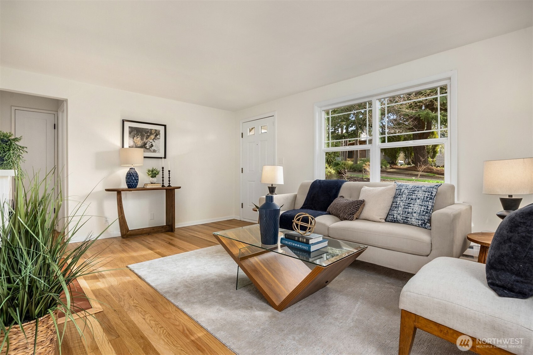 5606 Northeast 59th Street Seattle, WA 98105 - Photo 6 of 28 a living room with furniture and a lamp