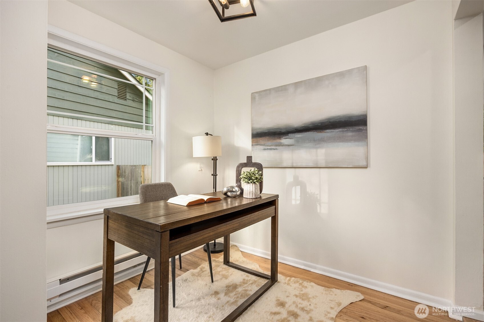 5606 Northeast 59th Street Seattle, WA 98105 - Photo 9 of 28 a workspace with furniture and window