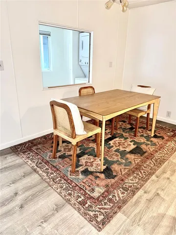 a outdoor view with a table and chairs