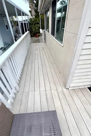 a view of outdoor space with deck and wooden floor