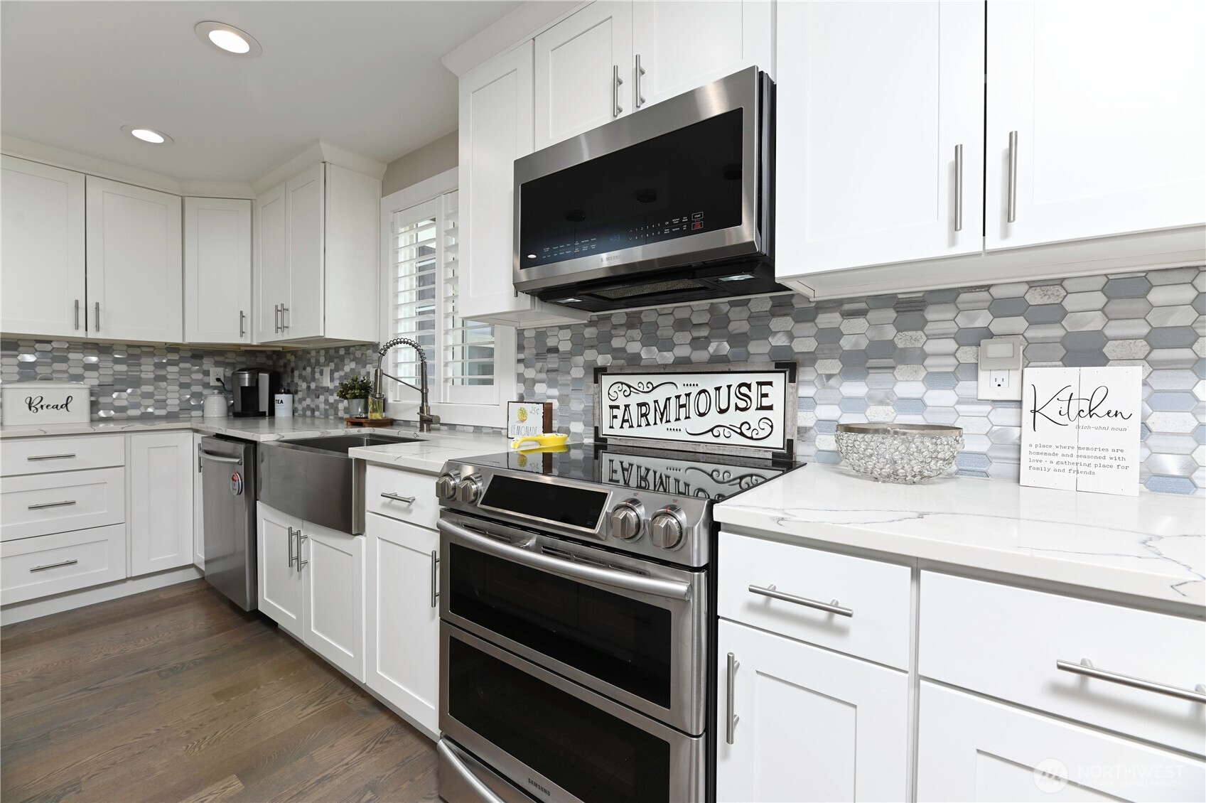 12523 Woods Lake Road Monroe, WA 98272 - Photo 11 of 40 a kitchen with stainless steel appliances white cabinets and stove
