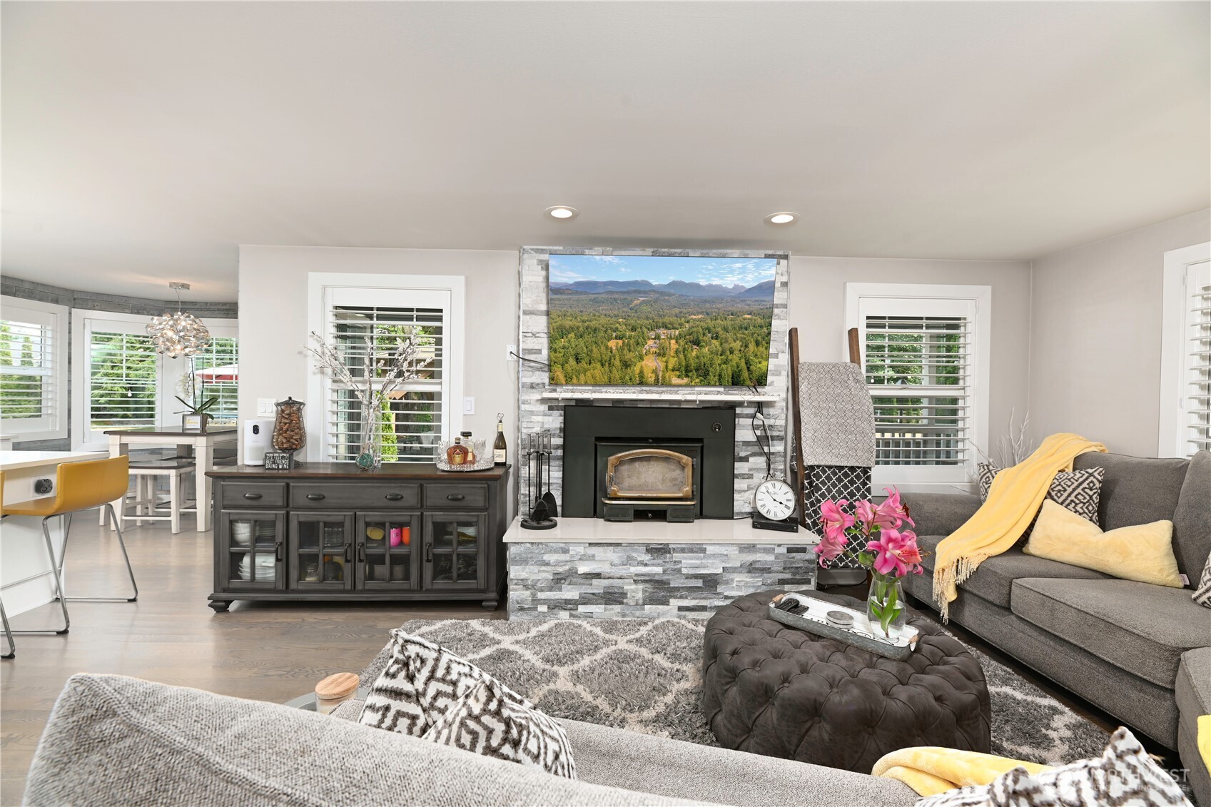 12523 Woods Lake Road Monroe, WA 98272 - Photo 15 of 40 a living room with furniture large window and a fireplace