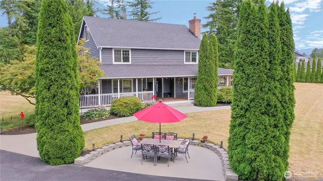 an outdoor space with patio and outdoor seating