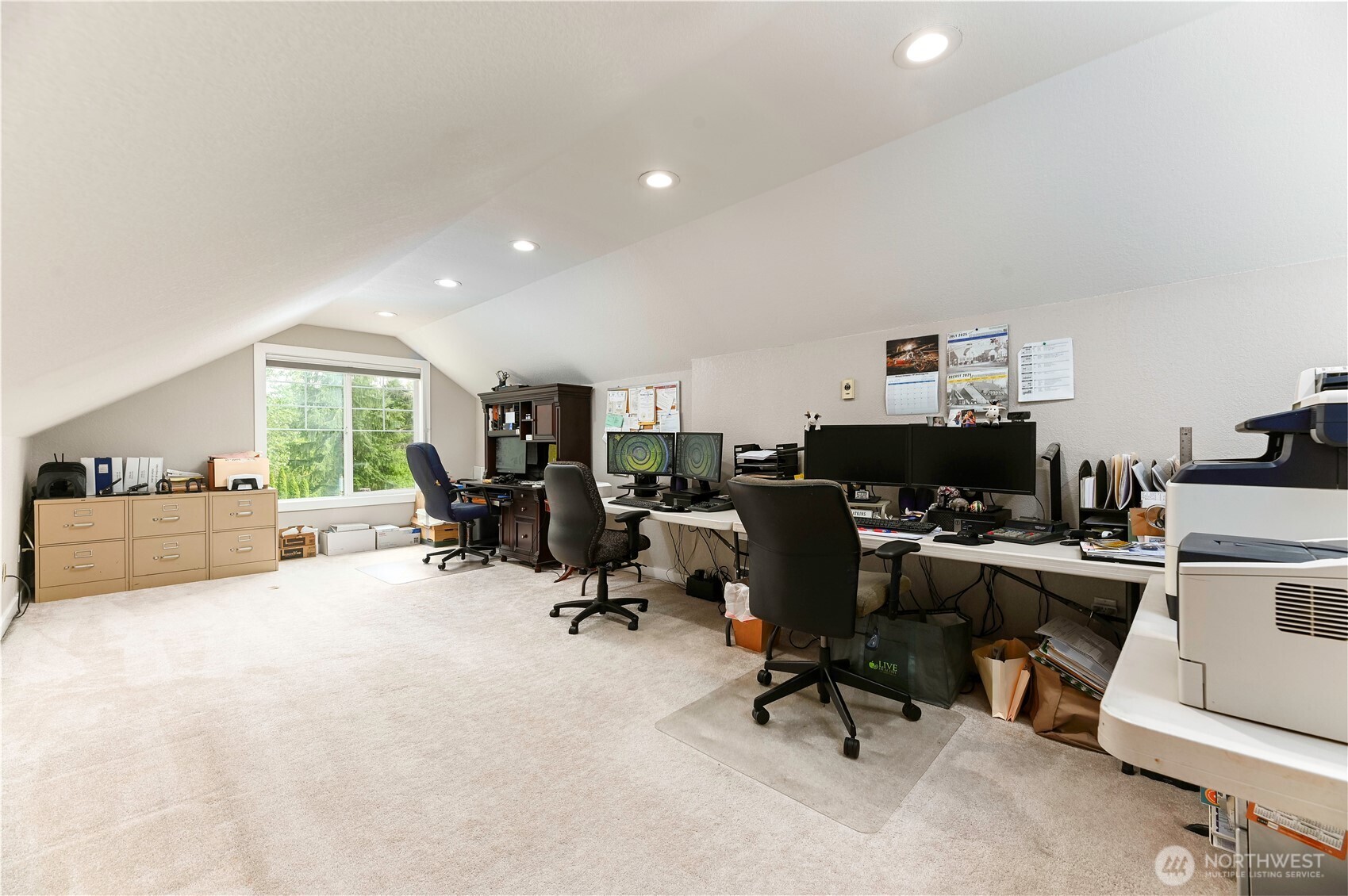 12523 Woods Lake Road Monroe, WA 98272 - Photo 29 of 40 a view of a workspace with furniture and a window