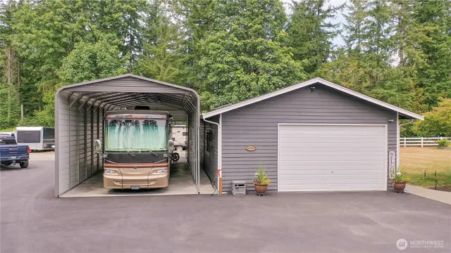 a view of house with a yard