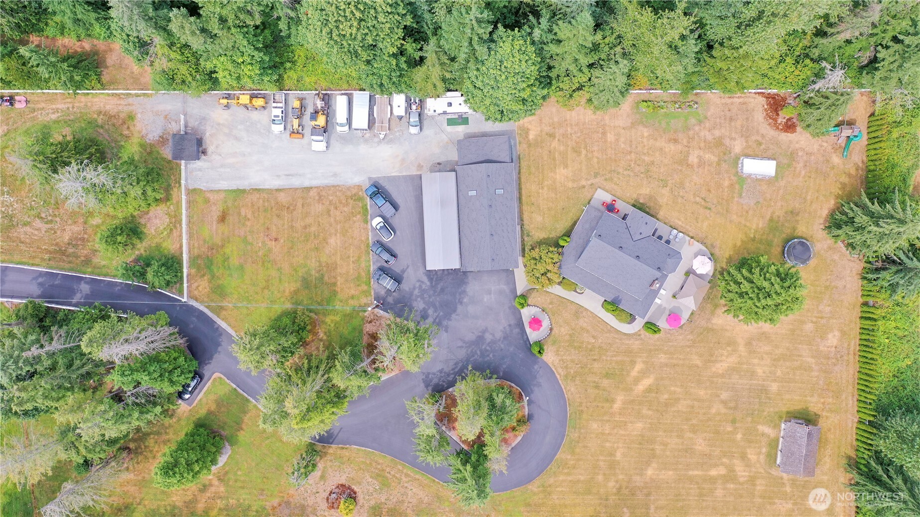 12523 Woods Lake Road Monroe, WA 98272 - Photo 5 of 40 an aerial view of a house with a yard and a large tree