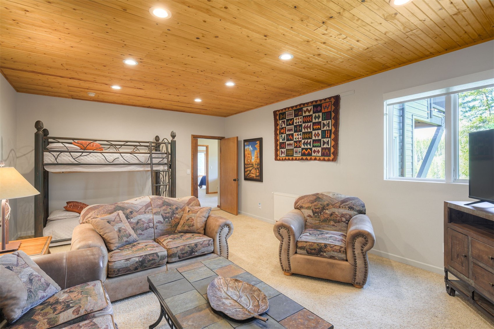 2542 Boreas Pass Road Breckenridge, CO 80424 - Photo 27 of 33 a living room with furniture and a window