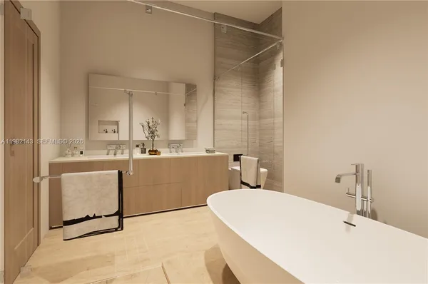 a bathroom with a sink vanity granite and a mirror